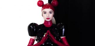 YouTuber Poppy Shows Her Shiny Mouse Side Poppy wearing Latex for her latest single, Metal
