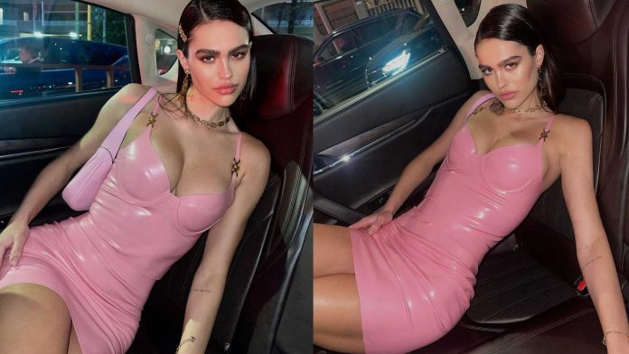 Amelia Gray Hamlin wears Pink Latex Fashion Versace Dress at Milan Fashion Week