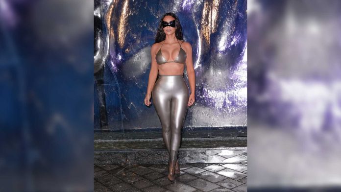 Kim Kardashian stuns in Vex Latex silver bikini and leggings in Miami