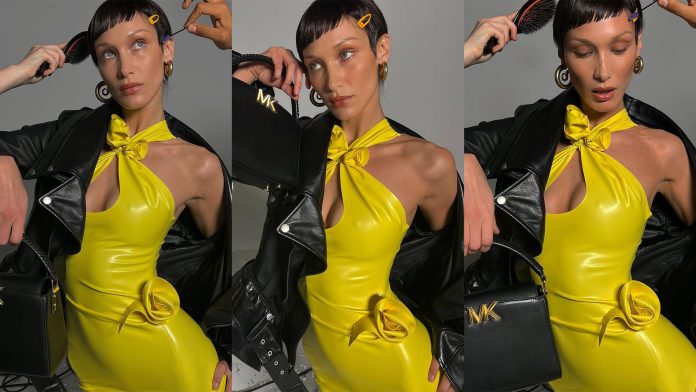 Bella Hadid wears Yellow Latex Dress from Coperni Paris for Michael Kors