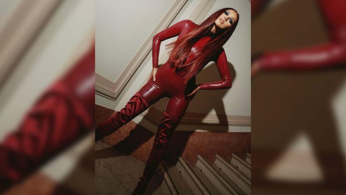 Shay Mitchell wears Versace Latex Catsuit at Milan Fashion Week