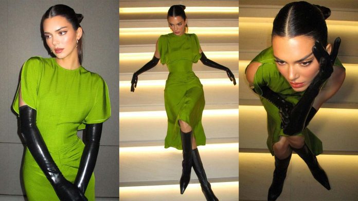 Kendall Jenner wears Victoria Beckham SS23 Ready-to-wear dress and latex clothing gloves
