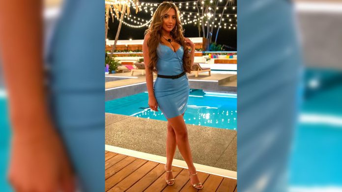 Tanyel Revan wears Versace Medusa latex dress on Love Island