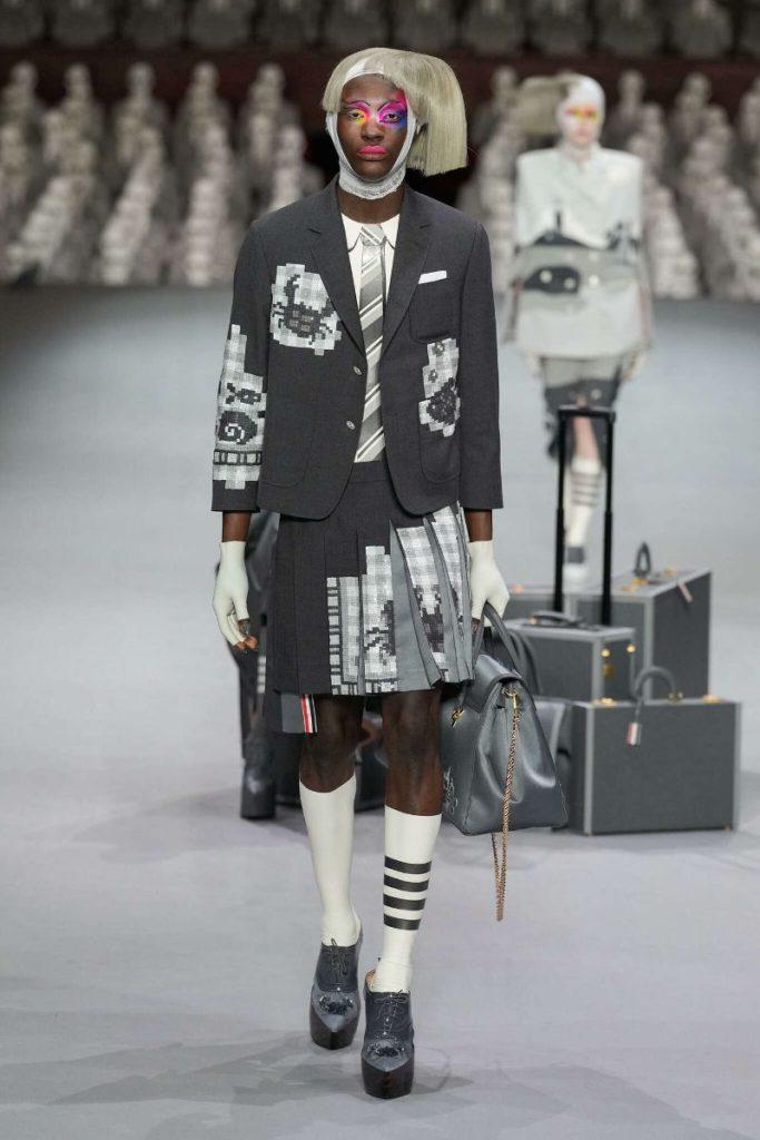 Model wears Vex Latex socks and gloves during Thom Browne Couture collection reveal