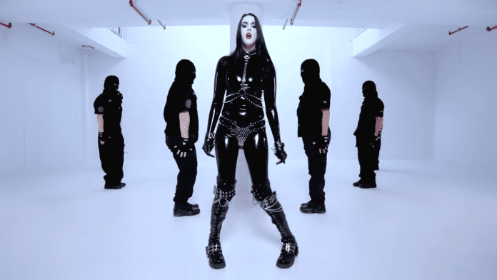 Night Club lead singer Emily Kavanaugh appears in latex catsuit in latest video for single 