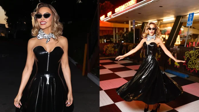 chrishell-stause-selling-sunset-libidex-latex-dress Star of Netflix show "Selling Sunset", Chrishell Stause, attends castmate Emma Hernan's party wearing a latex dress with a 1950s aesthetic