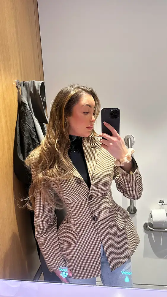 Ella Morgan wears Scarlett Society Label latex bodysuit, ASOS blazer and faded jeans for Kiss UK radio appearance